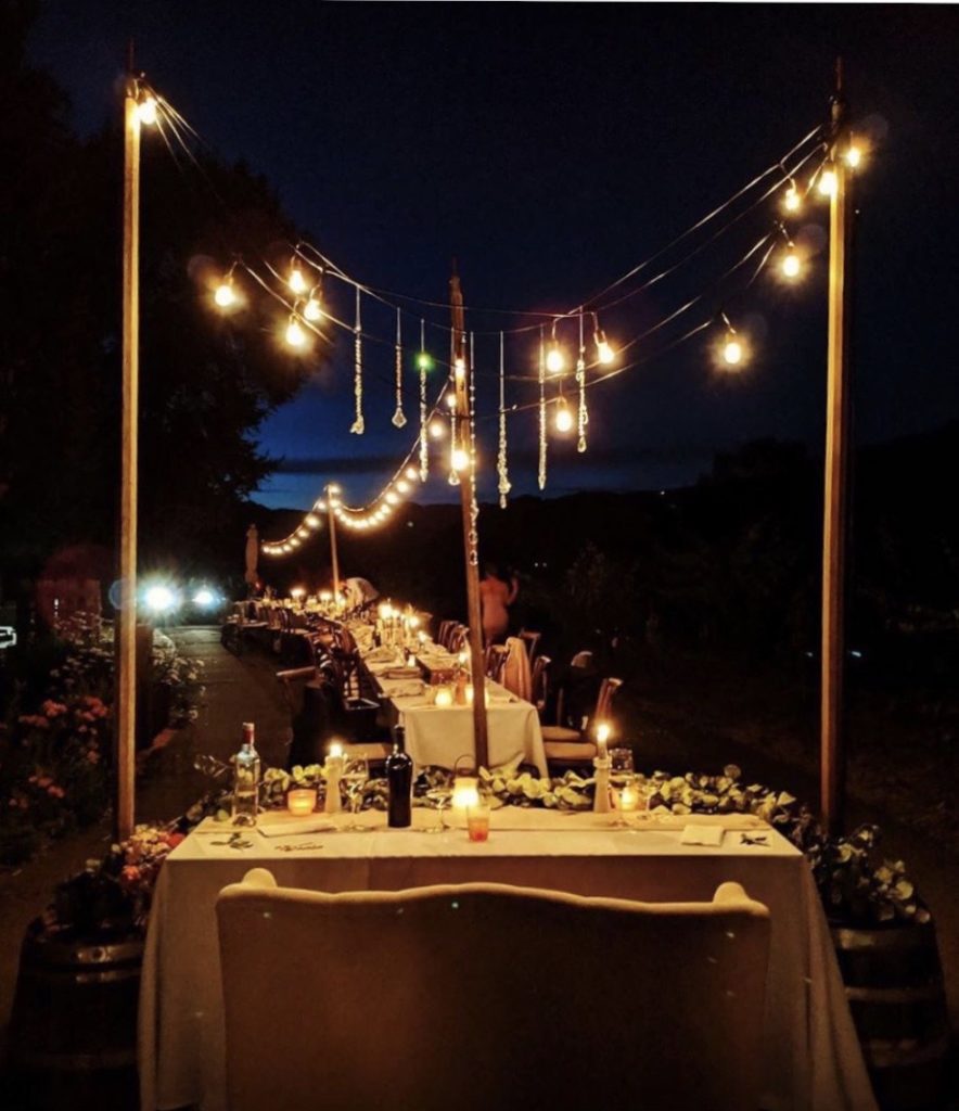 Wedding table arrangements in a night venue