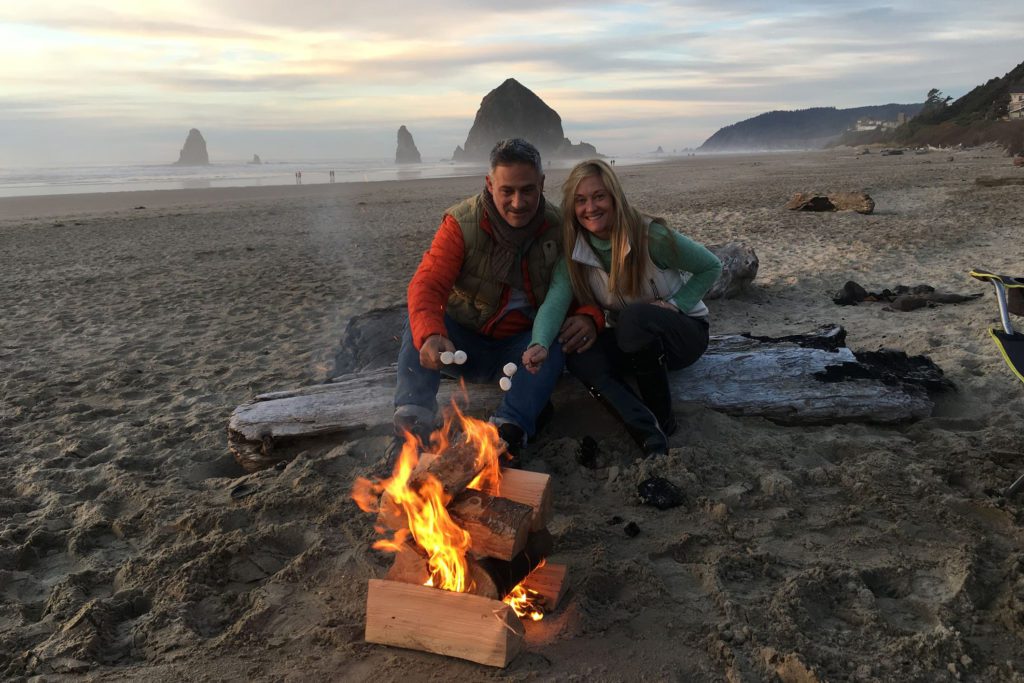 Chef Sam and his wife making a bonfire in the seashore